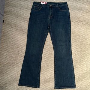 Men’s bootcut flare blue jeans in size 32L by 34W